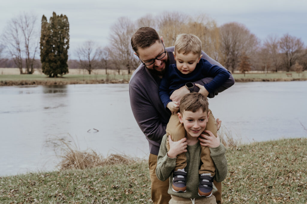 Picture of a dad with his two young sons